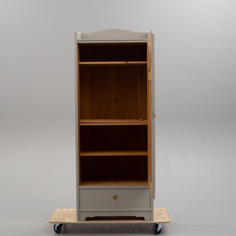 an early 20th century wardrobe.