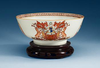 1627. A famille rose armorial punch bowl, Qing dynasty, Qianlong (1736-95).