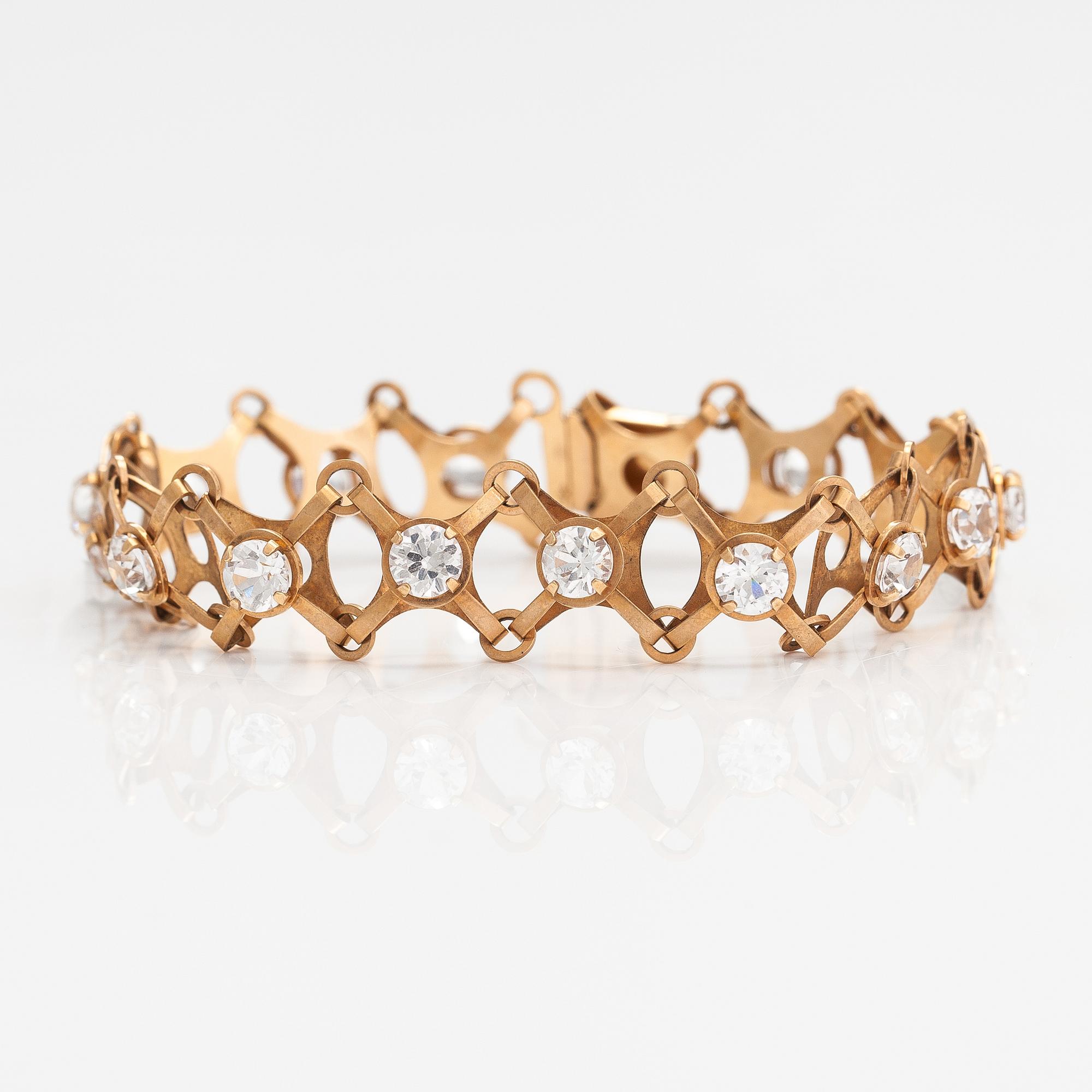 A 14K gold bracelet with synthetic spinels. Pentti KEvätlahti, Turku 1969.