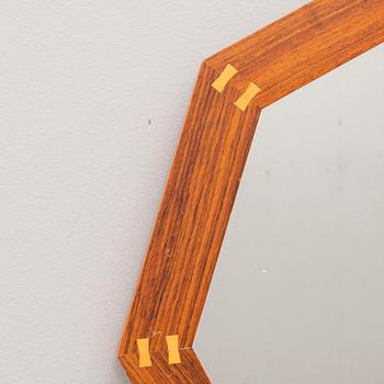 A Sigvard Bernadotte jacaranda mirror for Aktuell Form later part of the 20th century.