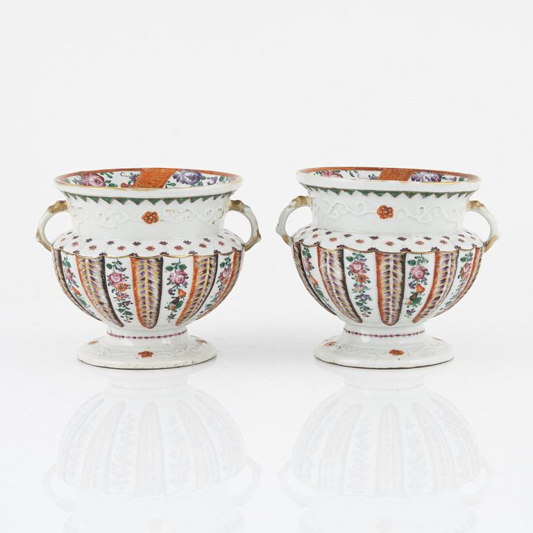 A pair of famille rose flower pots, Qing dynasty, Qianlong (1736-95).