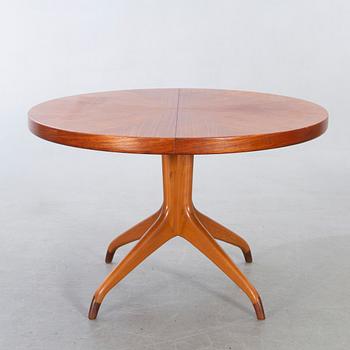 David Rosén, A table and flour chairs.