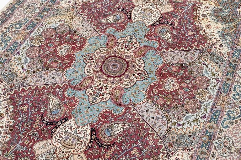 A Tabriz, carpet, 310 x 195 cm. signed.