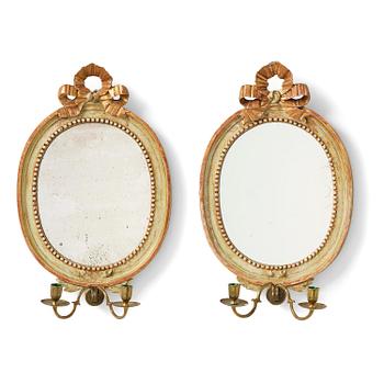 117. A pair of Gustaviantwo-branch giltwood girandole mirrors by C. G. Fyrwald (master in Stockholm 1776-1825).