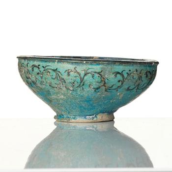 A luster earthenware bowl, Kashan, central Persia, 13th century.