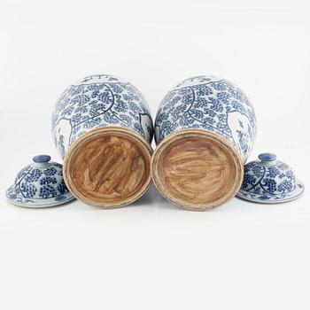 A pair of blue and white porcelain floor urns, China, 20th century.