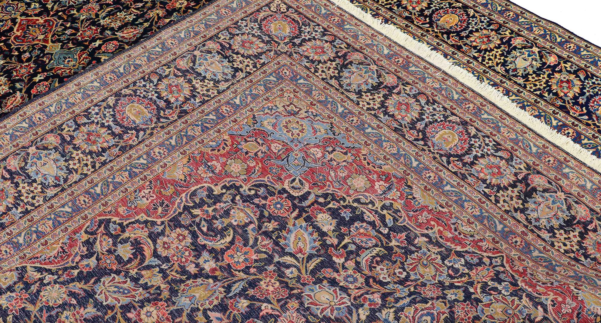 A Keshan carpet, 338 x 264 cm.