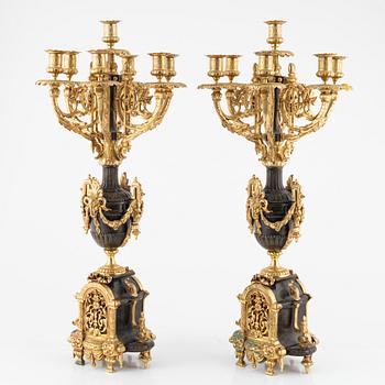 A pair of bronze candelabra, late 19th Century.