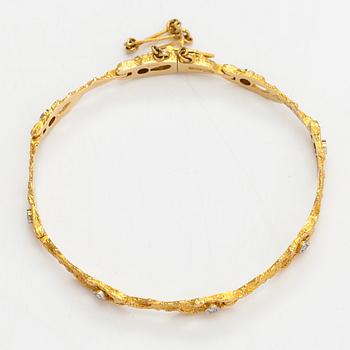 Björn Weckström, An 18K gold bracelet "Diamond pond" with diamonds ca. 0.16 ct in total. Lapponia 1974.