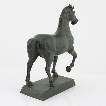 A patinated metal sculpture after the Horses of Saint Mark.