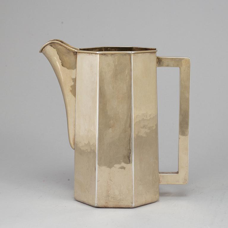 A 20th century sterling silver water-jug, marked The Kalo Shops Chicago.