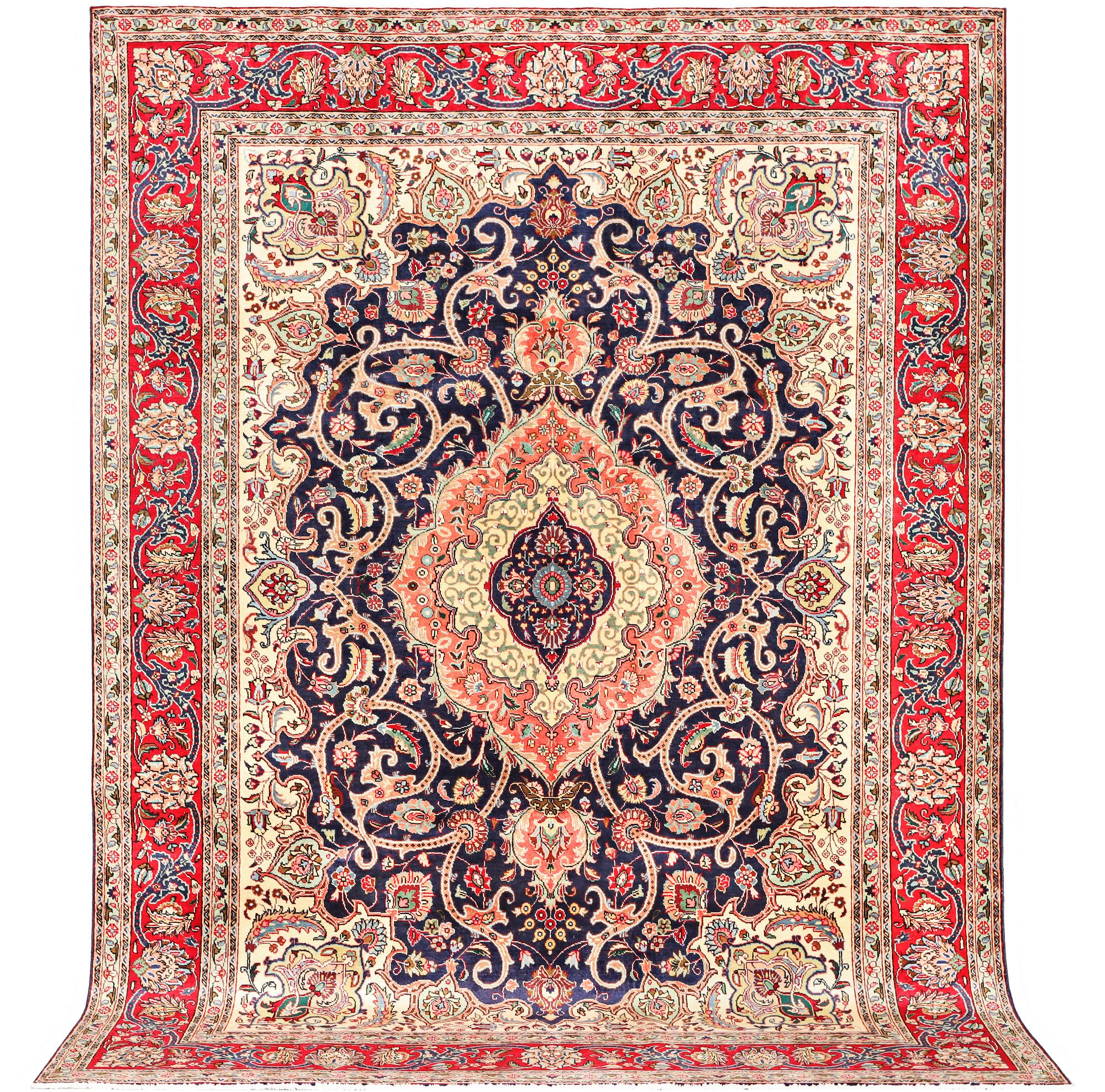 A Tabriz carpet, c. 345 x 255 cm.