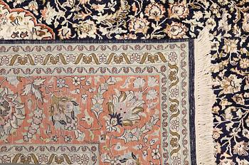 A silk carpet, Kashmir, c. 357 x 274 cm.