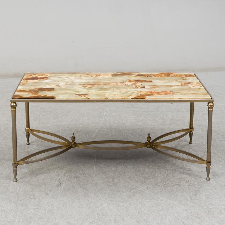 a metal and onyx coffee table from the mid 20th century.