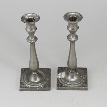 A pair of empire pewter candlesticks, first half of the 19th century.