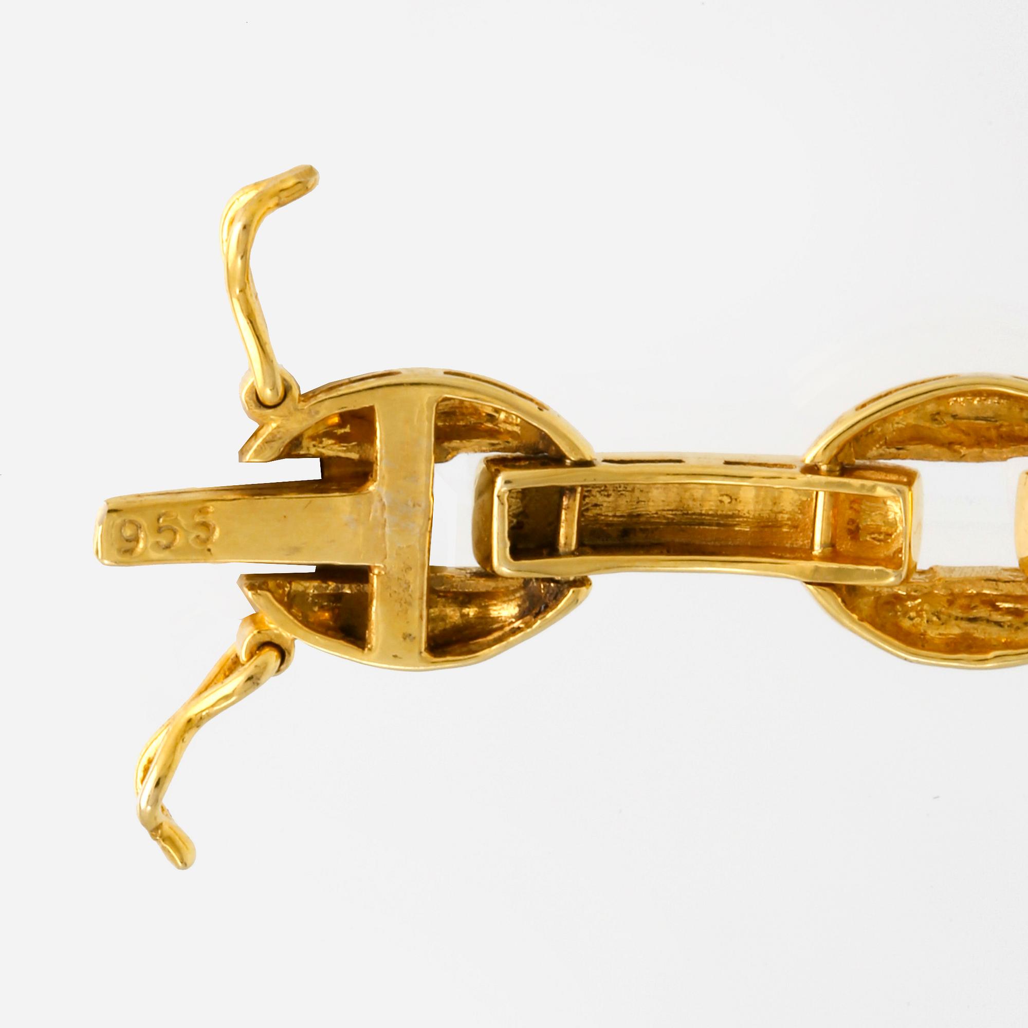 Armband, 14K guld med carréslipade smaragder och diamanter 8/8, ca 19 x 1 cm.