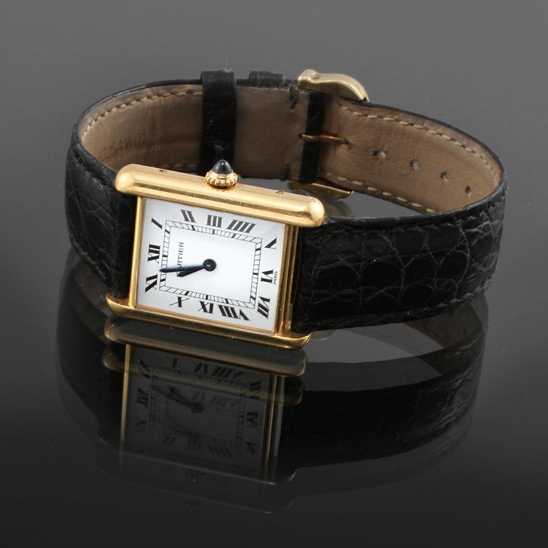 ARMBANDSUR, dam, 18 k guld, "Tank", Cartier, enligt certifikat 1982.