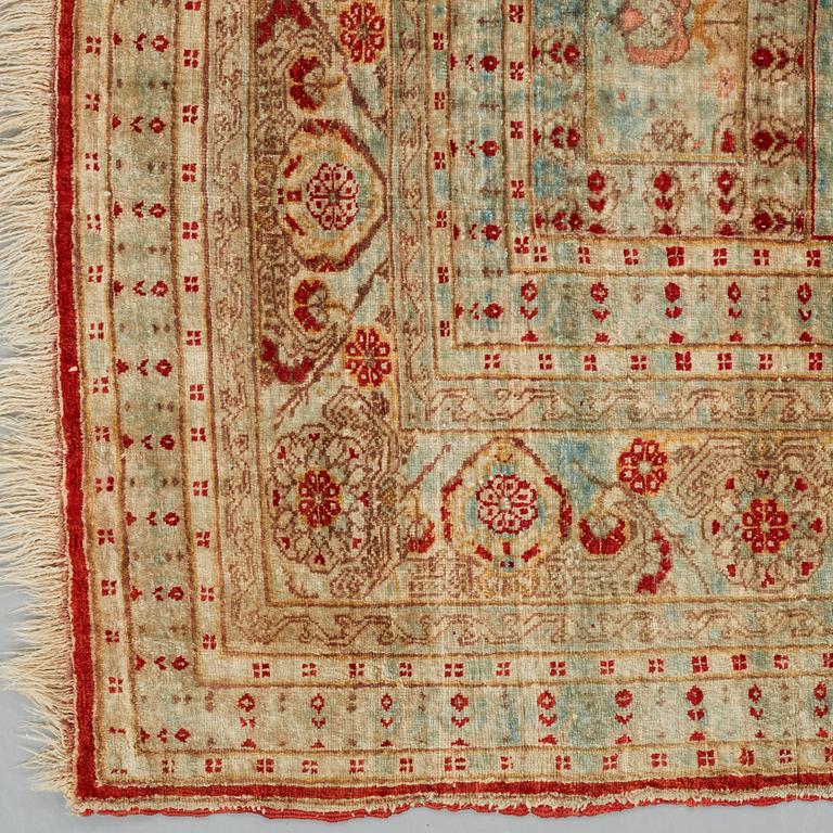 MATTO, an antique silk Tabriz, ca 165 x 122,5 cm.