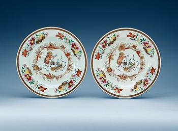 1438. A pair of famille rose chargers. Qing dynasty, Qianlong (1736-95).