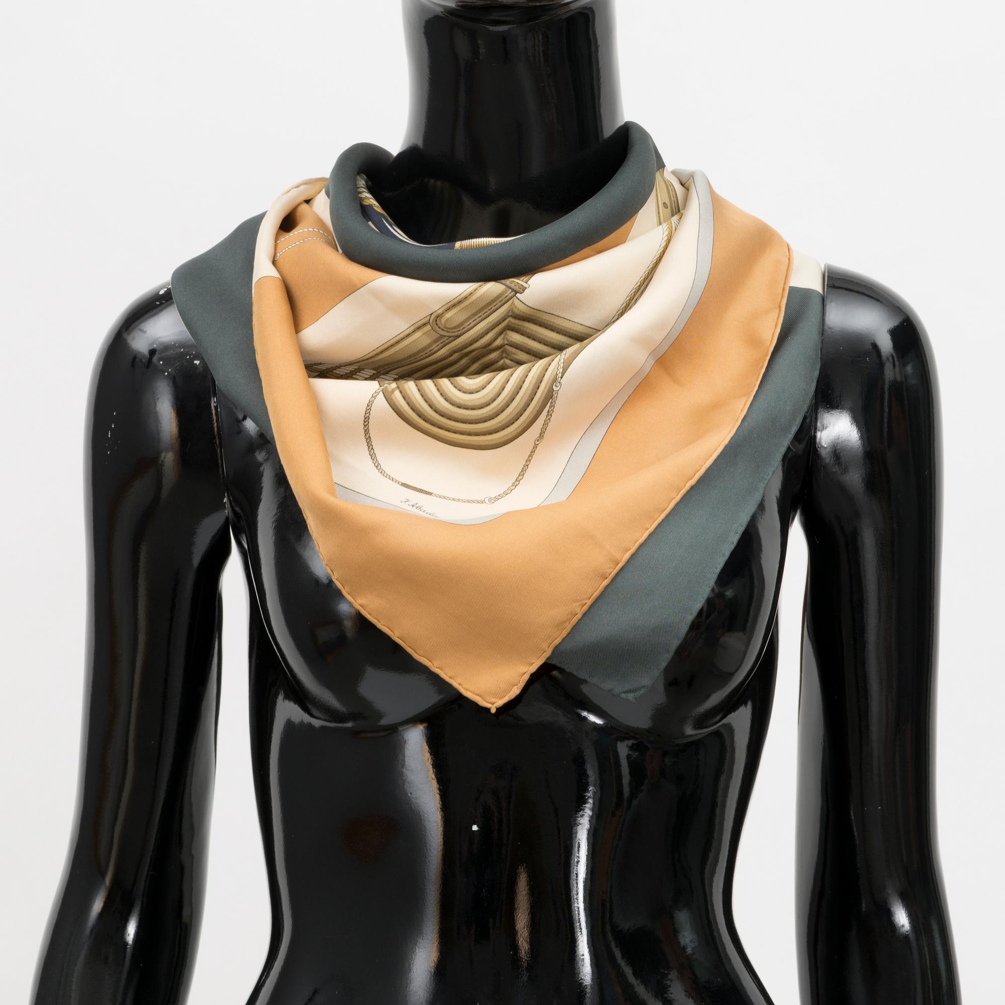 A Hermès silk scarf, "Clic Clac".