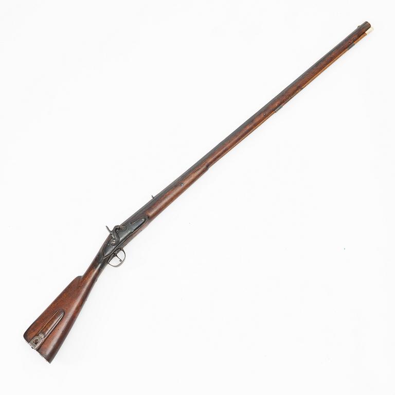 Percussion gun.