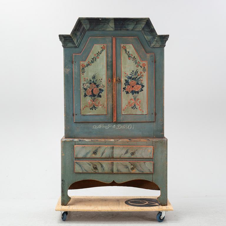 A painted Swedish cabinet from Jämtland, dated 1801.