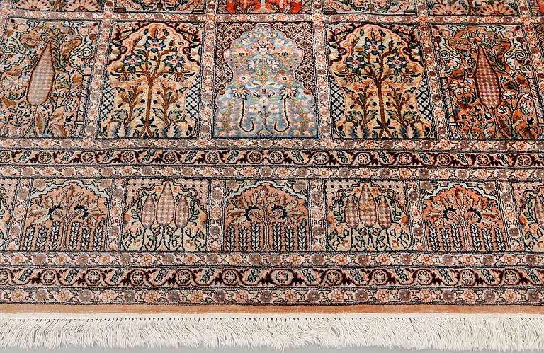 A silk Kashmir carpet, approx. 327 x 243 cm.