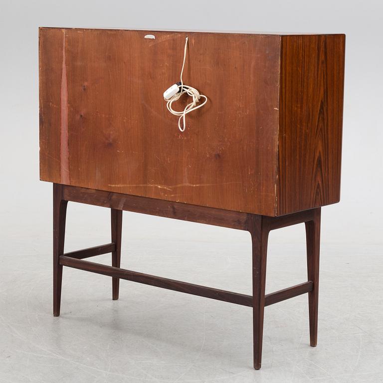 KURT ØSTERVIG, a Danish rosewood veneered drinks cabinet, 1960's.