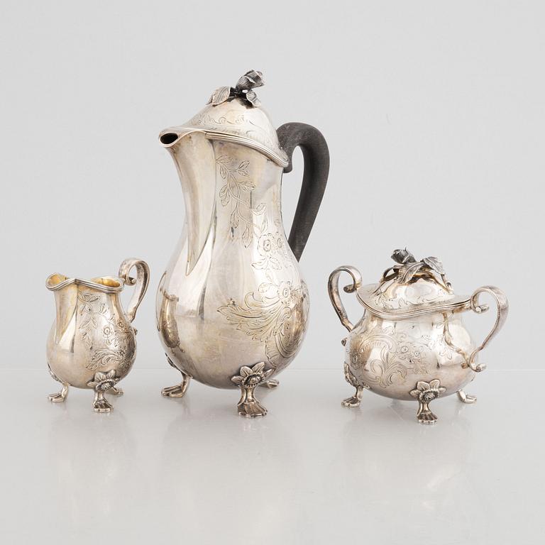 A Swedish Silver Coffee Pot, Creamer and Sugar Bowl, mark of W.A. Bolin, Stockholm 1956-62.