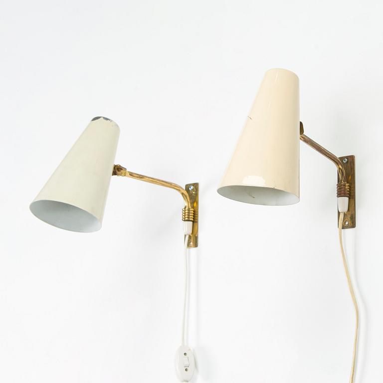 A pair of mid-20th century wall lamps.