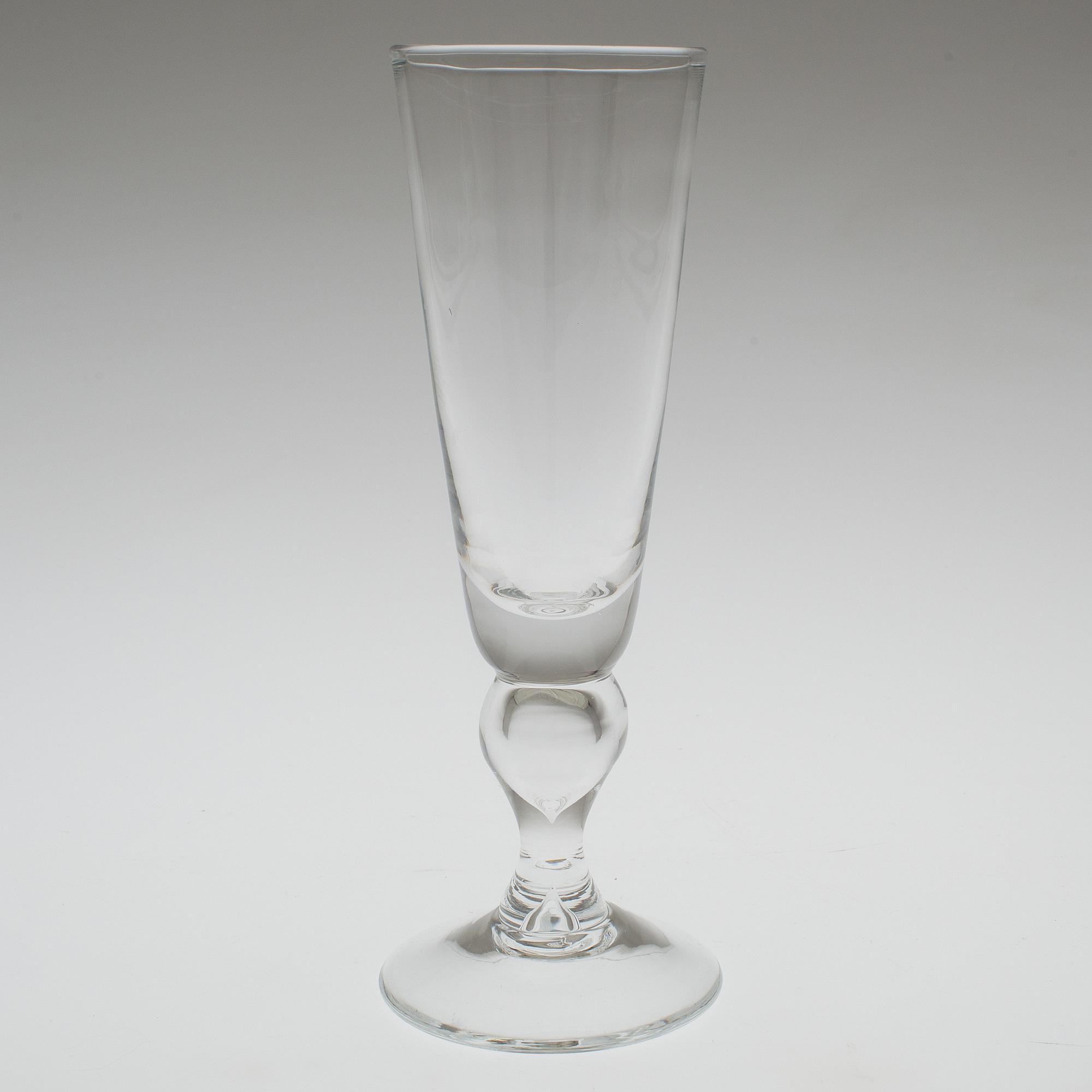 A set of twelve "Antik" wine glasses by Reijmyre Glasbruk.