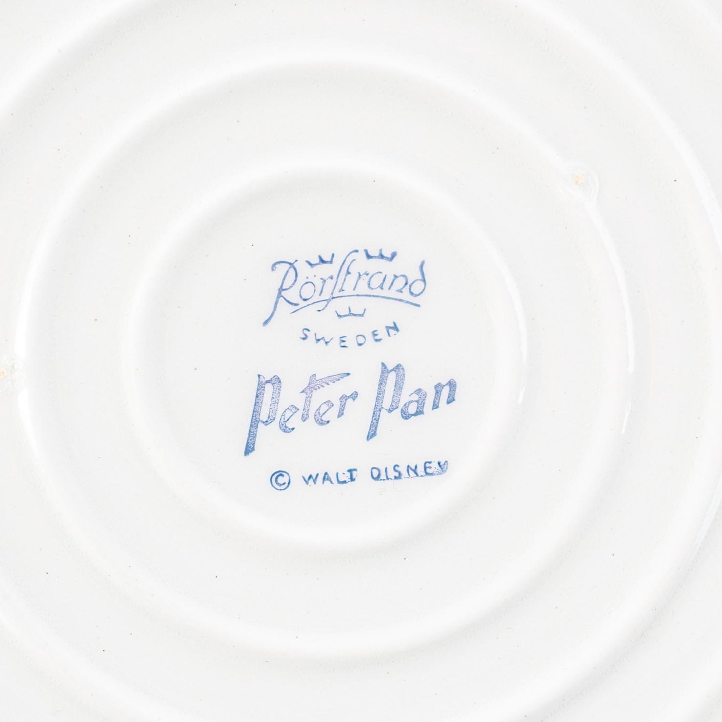 Rörstrand & Walt Disney, an 11 pcs "Peter Pan" creamware service.