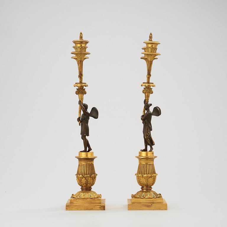 A pair of Empire early 19th century two-light candelabra.