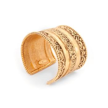 483. CHANEL, a gold colored metal cuff braclet.