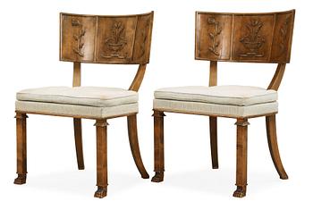 442. A pair of Axel-Einar Hjorth Swedish Grace antique patinated 'Caesar' chairs, Nordiska Kompaniet, Sweden.
