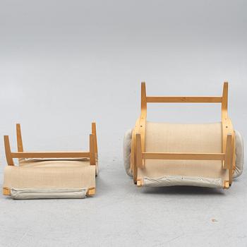 Bruno Mathsson, a 'Pernilla' easy chair witr foot stoll., Dux.