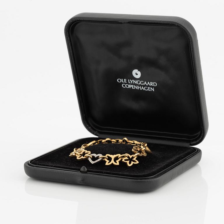 Ole Lynggaard bracelet in 18K gold with round brilliant-cut diamonds.