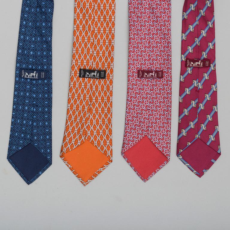 A set of four ties by Hermès.