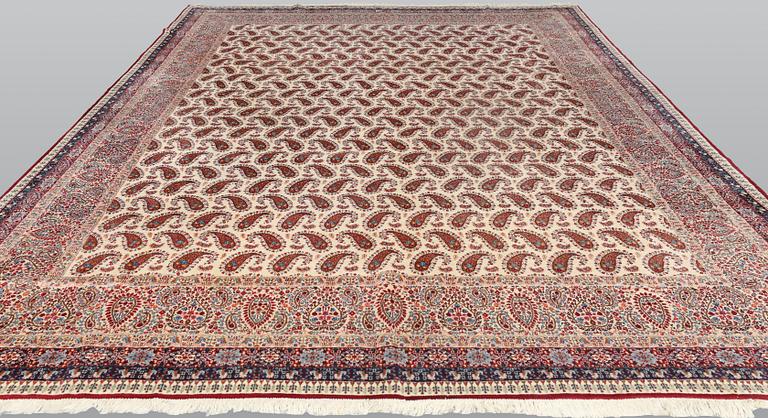 A Kirman carpet, signed, c. 390 x 295 cm.