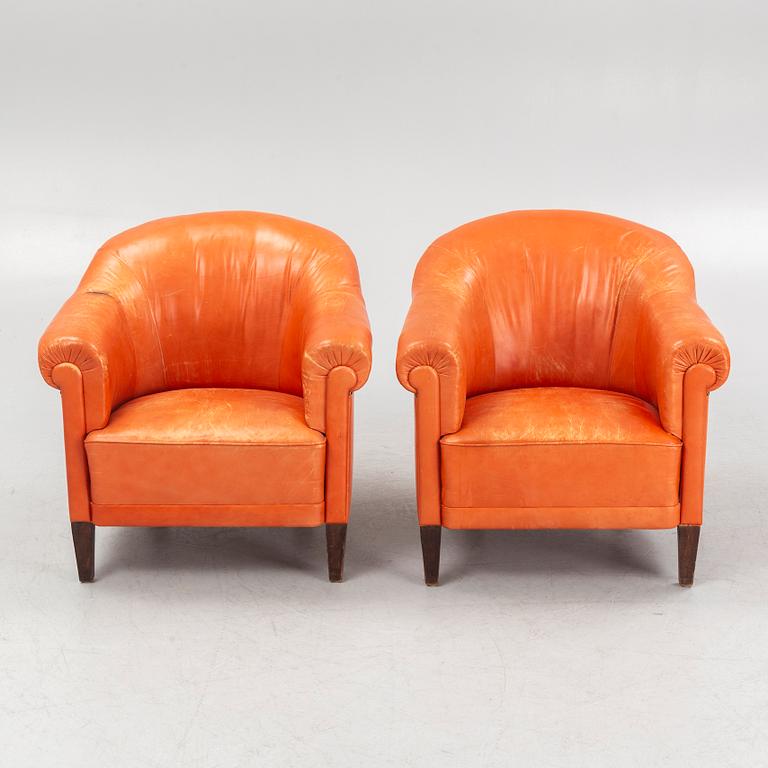 A pair of club armchairs, 20th Century.