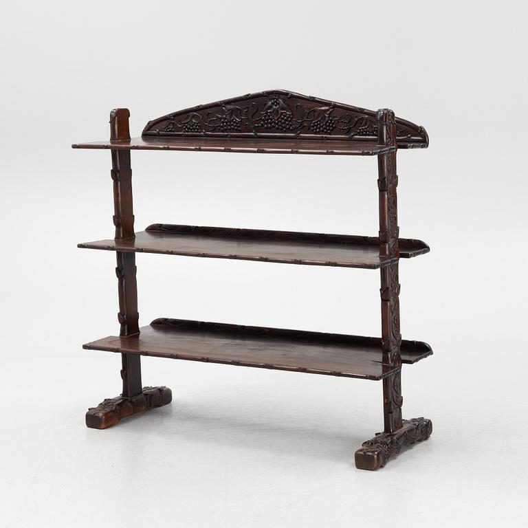 A Chinese hardwood shelf, 20th century.