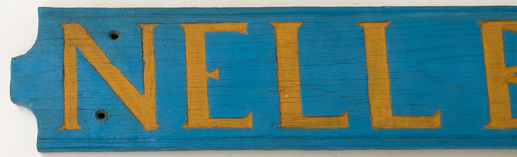 Namnskylt för båt "Nell Britt" 1900-tal.