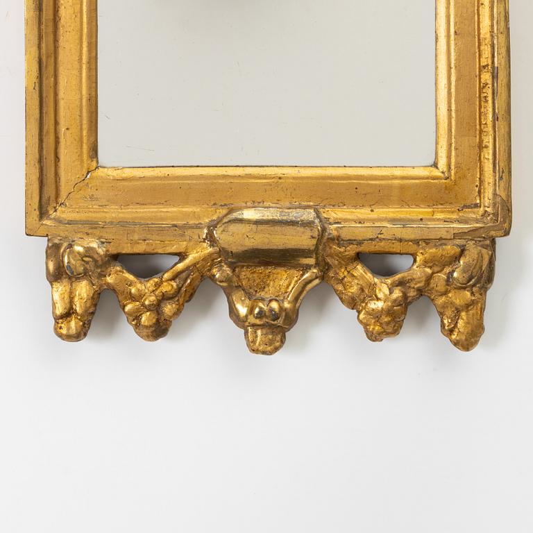 A Gustavian giltwood mirror, late 18th century.
