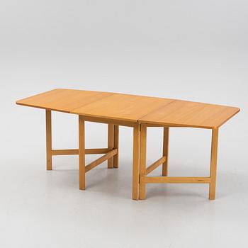 A gate-legged table by Nordiska Kompaniet 1956.