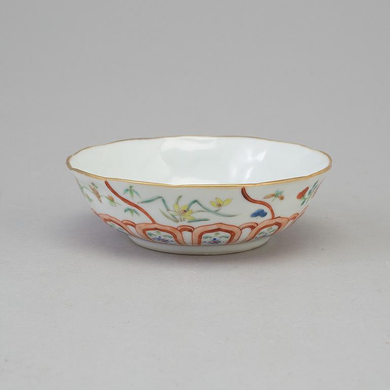 A Chinese 20th century famille rose porcelain dish, with Daoguangs seal to the base.