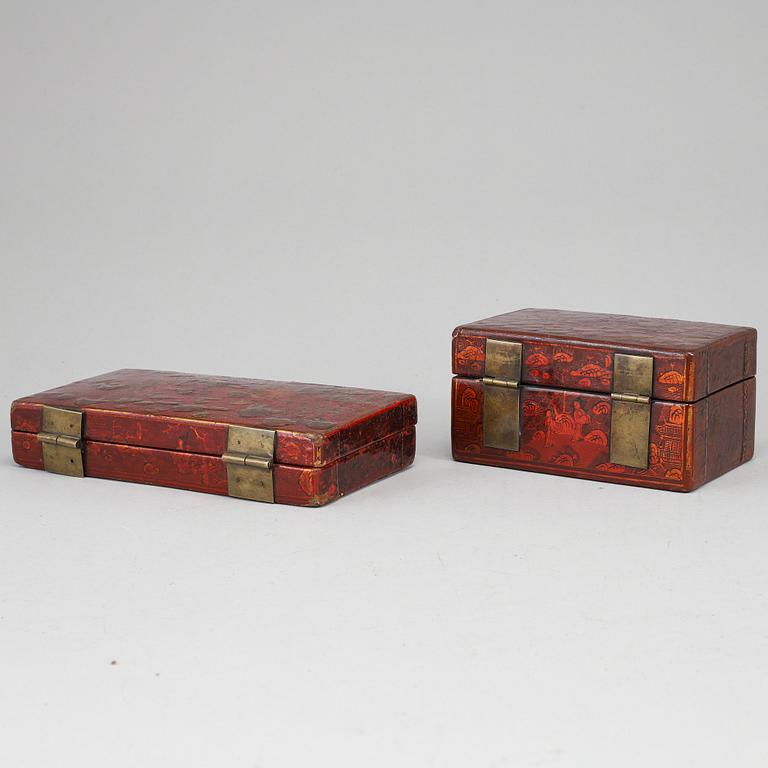 Two lacquered boxes with covers, circa 1900.