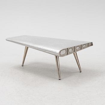 A coffee table constructed by a plane wing, second half of the 20th Century.