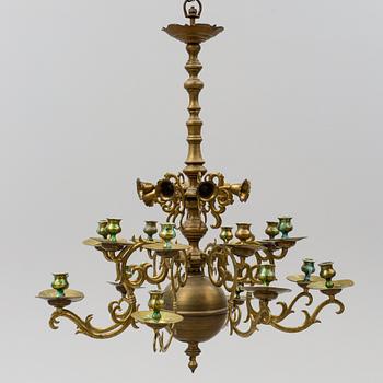 A brass Baroque style chandelier. 20th Century.