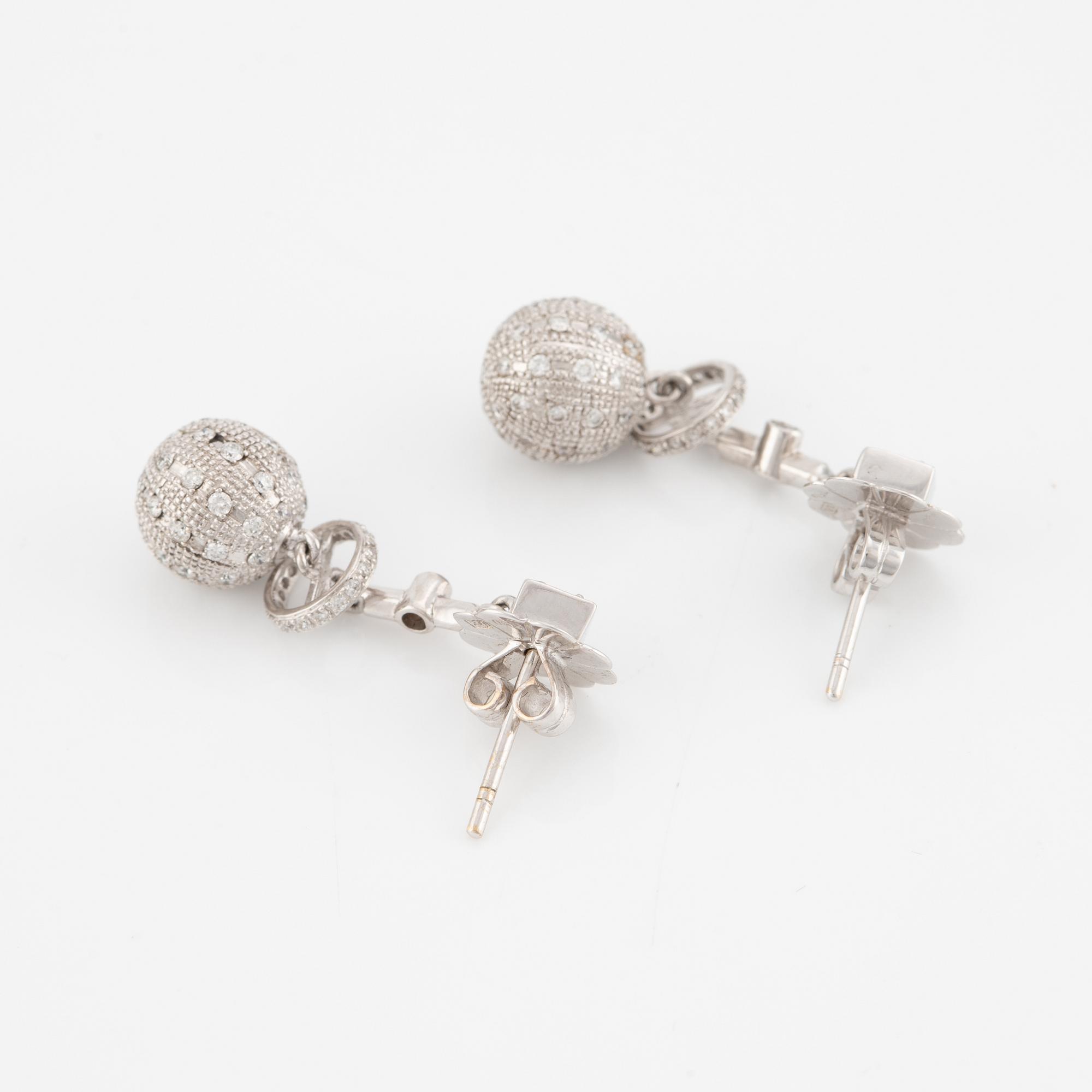 Earrings, 18K white gold with brilliant-cut diamonds.