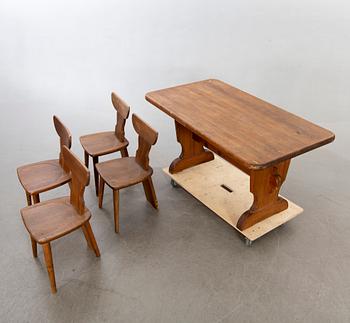 A five pieces 1930:s pine dining set.